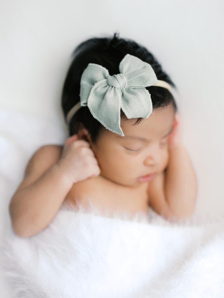a baby sleeps at her minneapolis baby photos